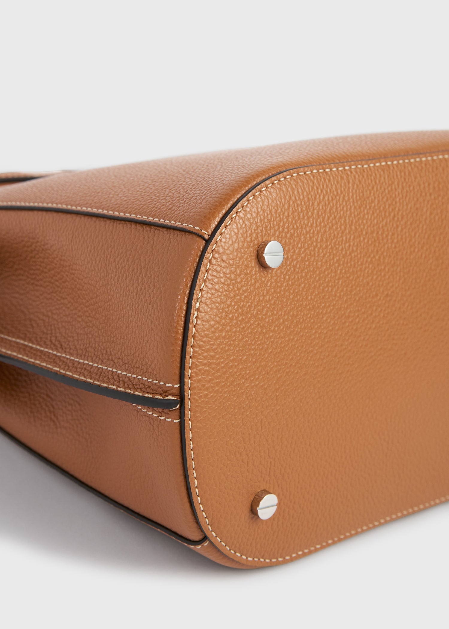 Belted grained-leather bucket bag tan