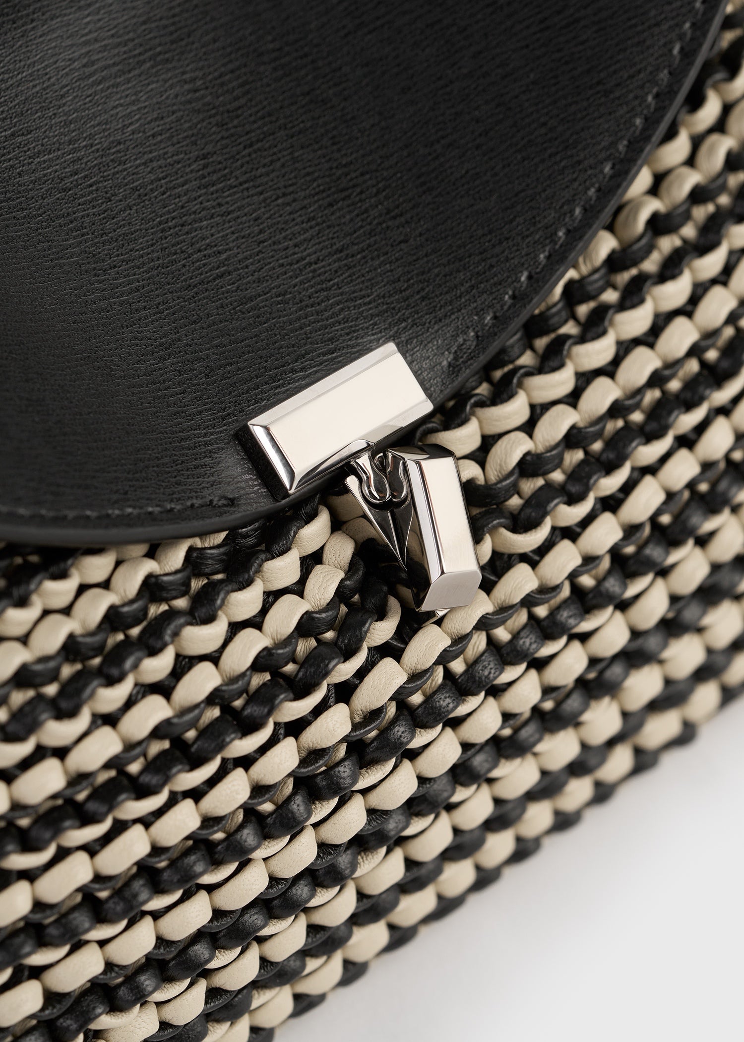 Mini T-lock woven-leather clutch black/sand