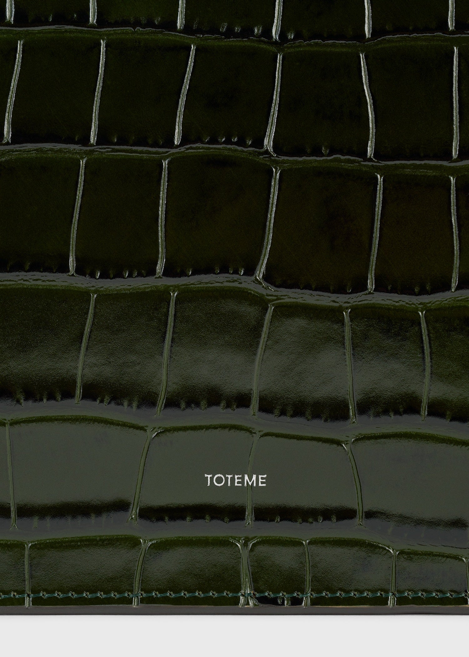Threefold croco-embossed clutch dark green