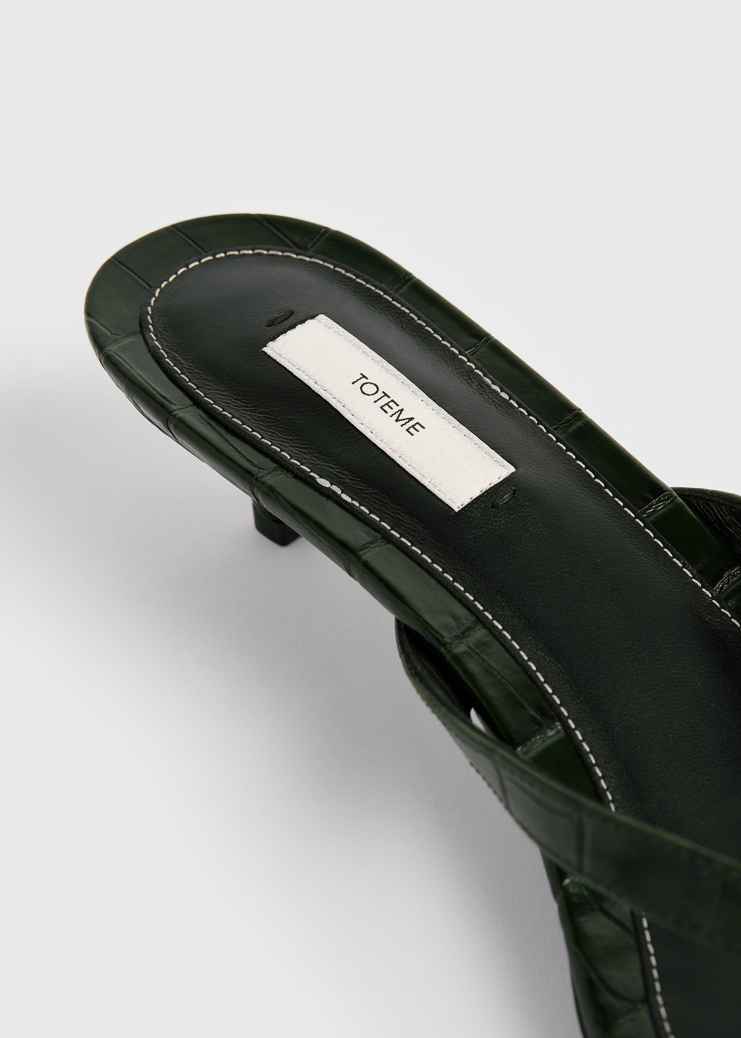 Croco-embossed heeled flip flops dark green