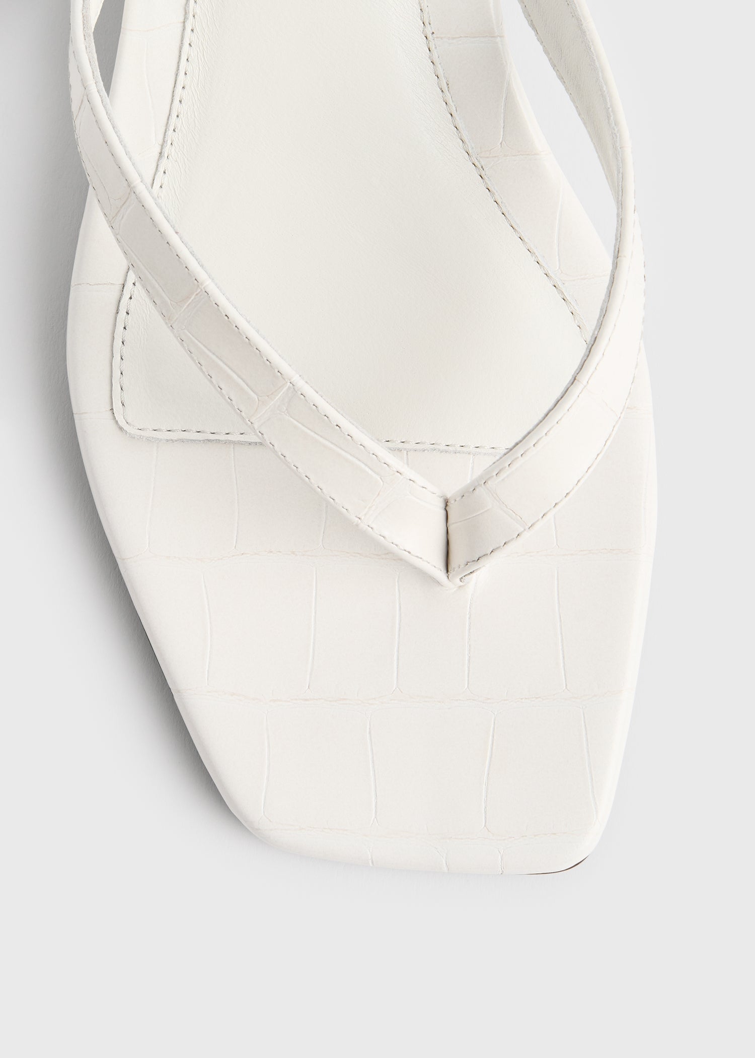 Croco-embossed heeled flip flops off-white