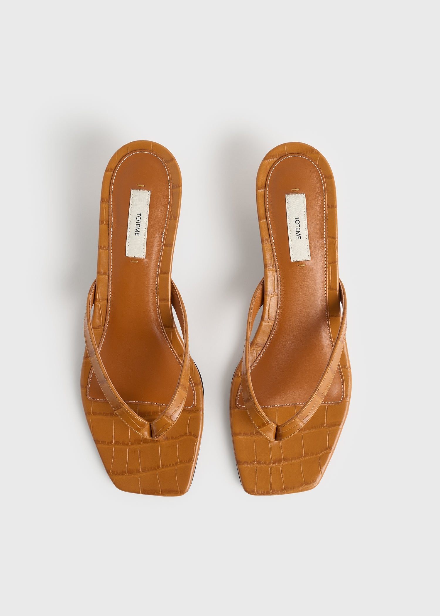 Croco-embossed heeled flip flops tangerine