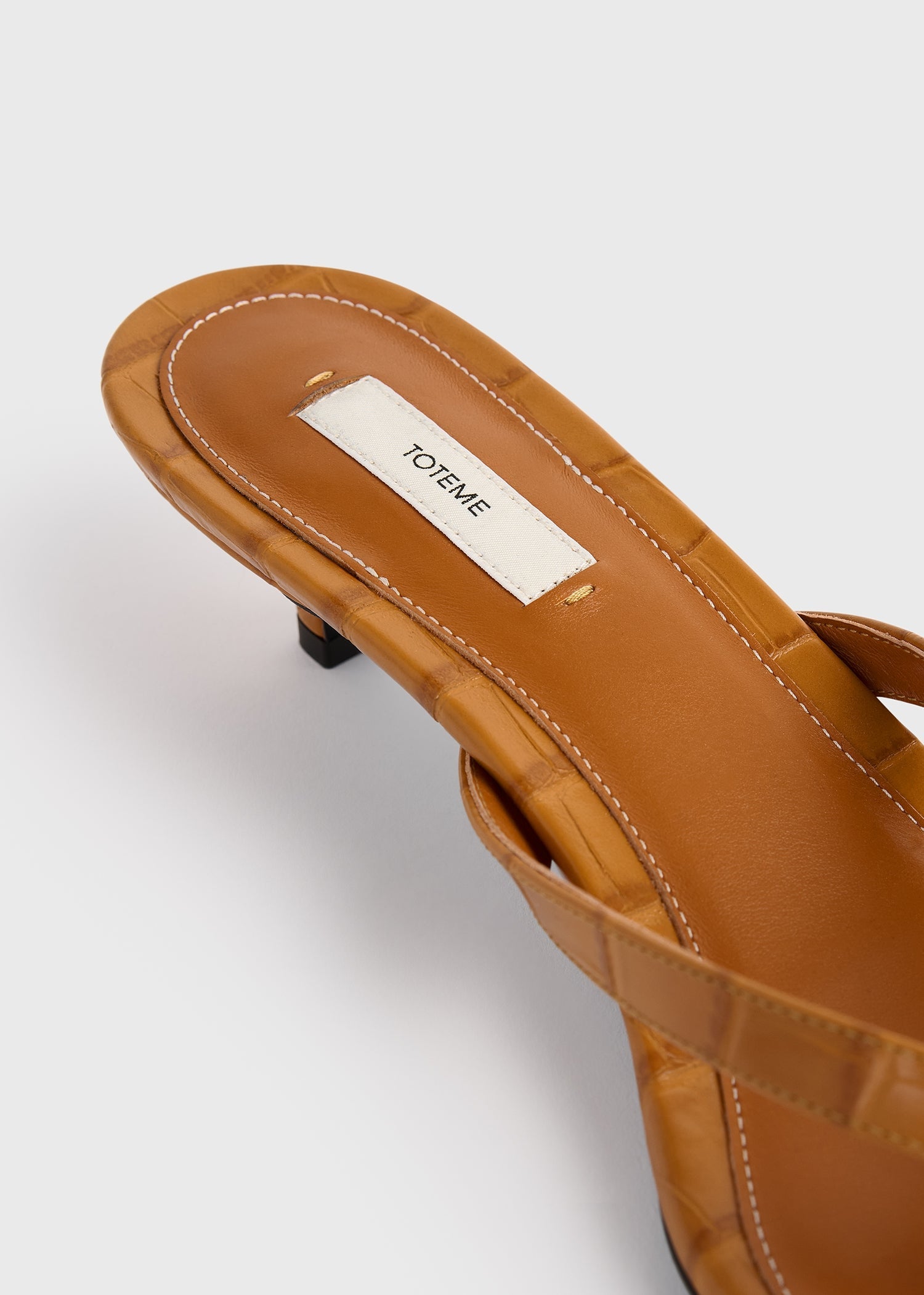 Croco-embossed heeled flip flops tangerine