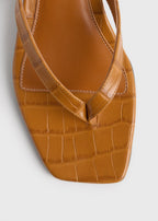 Croco-embossed heeled flip flops tangerine