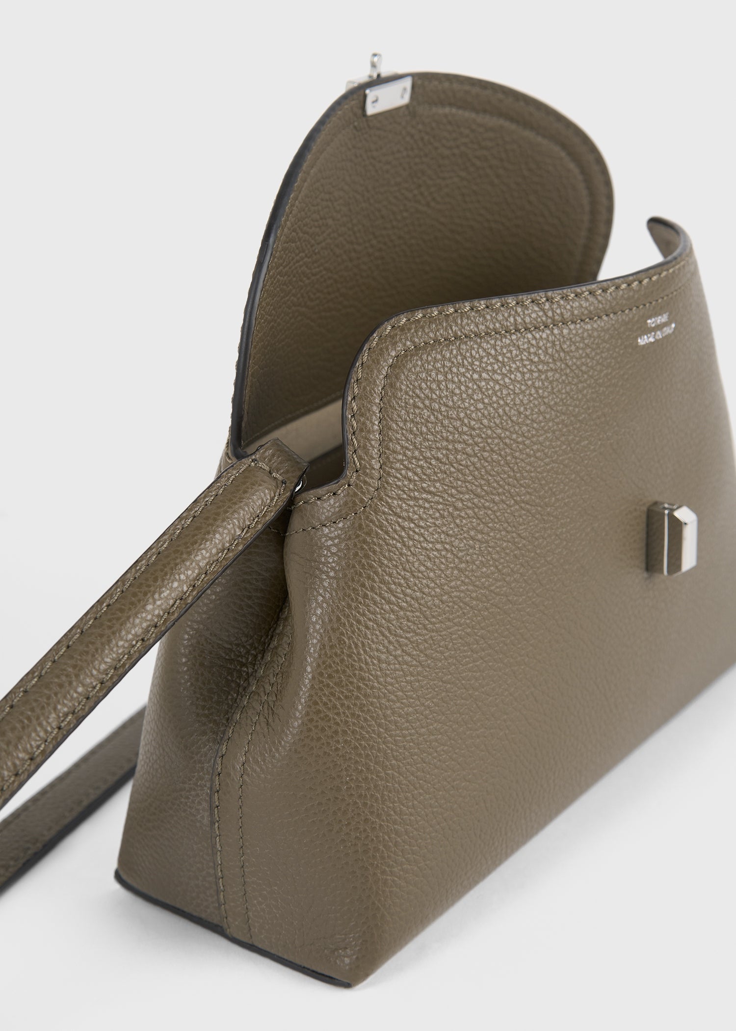 T-lock grained-leather clutch dark taupe – TOTEME