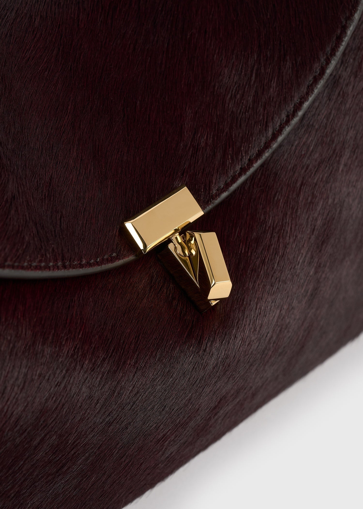 T-lock pony hair clutch wine