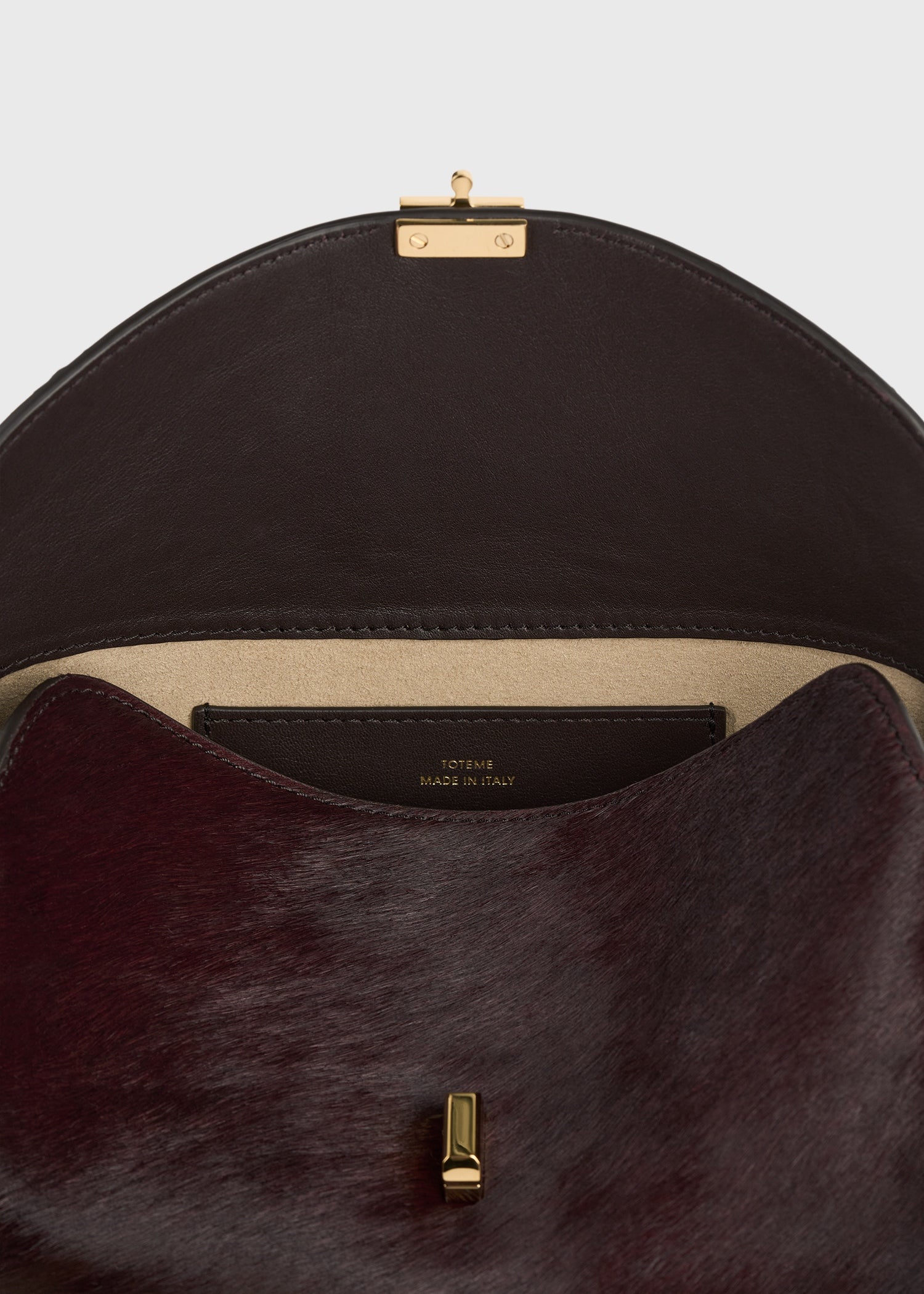 T-lock pony hair clutch wine