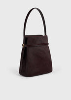 Belted pony hair bucket bag wine