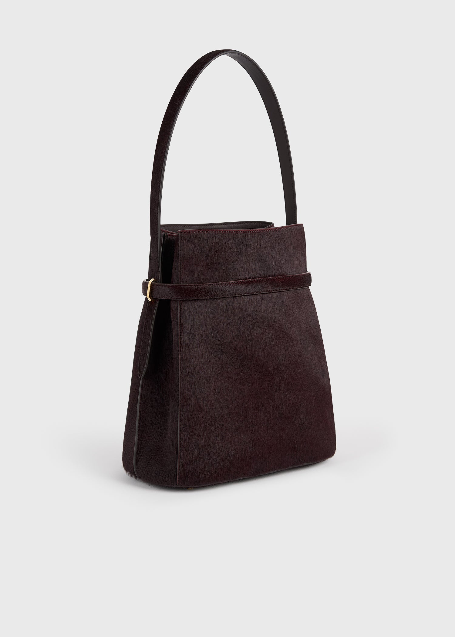 Belted pony hair bucket bag wine