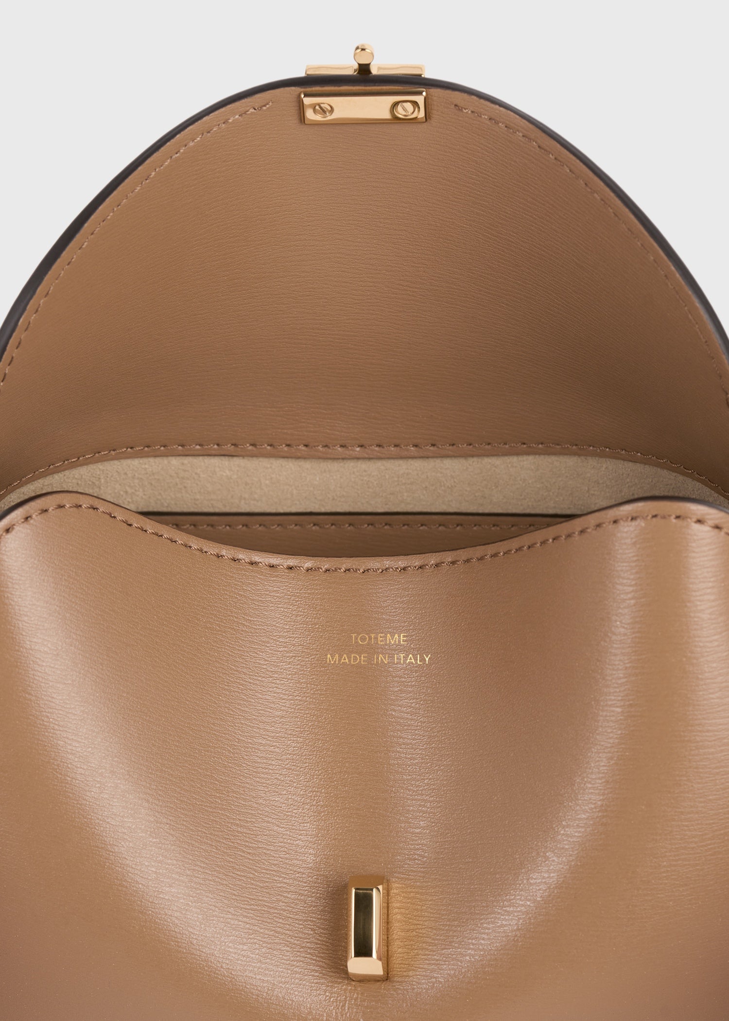 Mini T-lock leather clutch camel