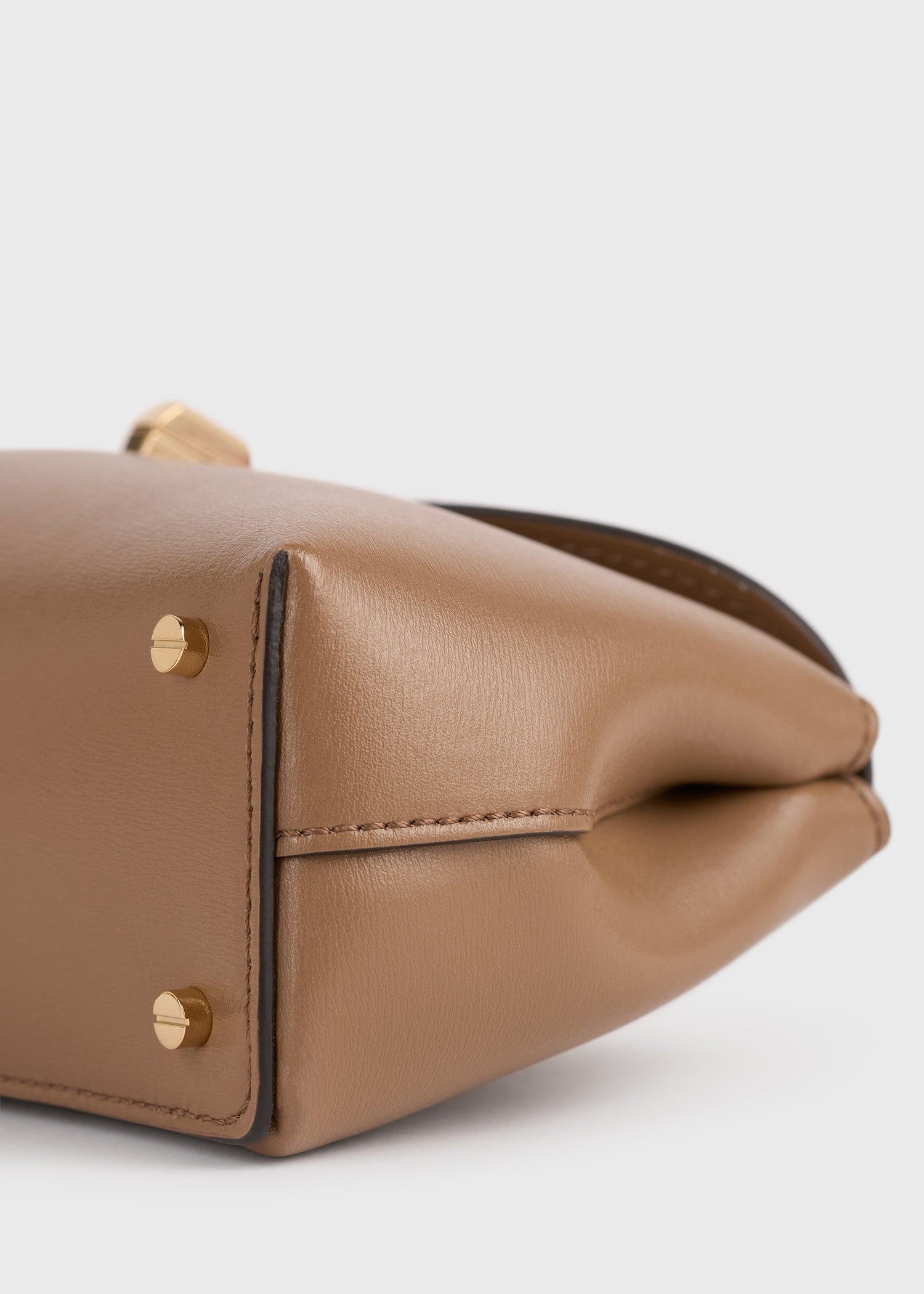 Mini T-lock leather clutch camel
