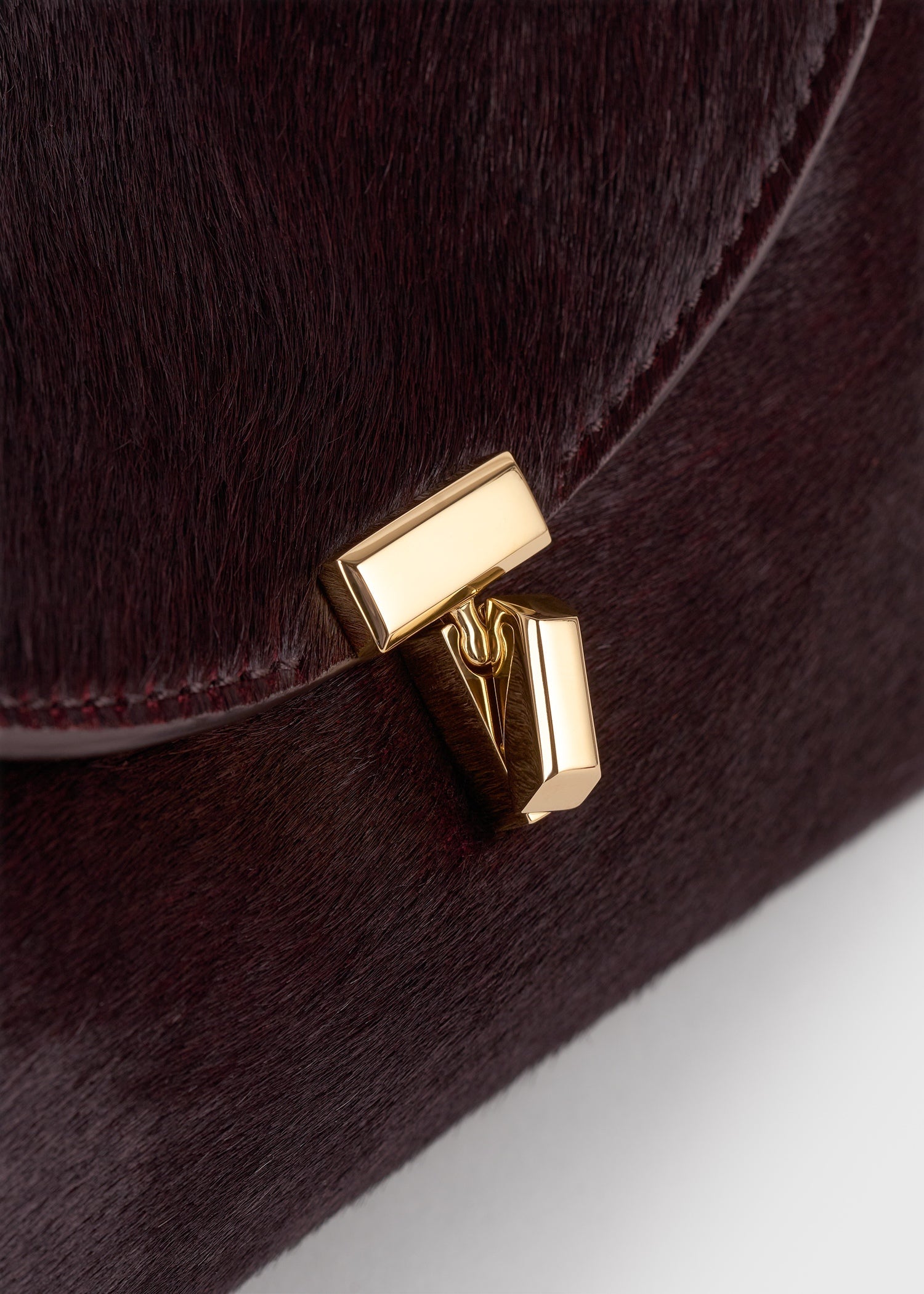 Mini T-lock pony hair clutch wine