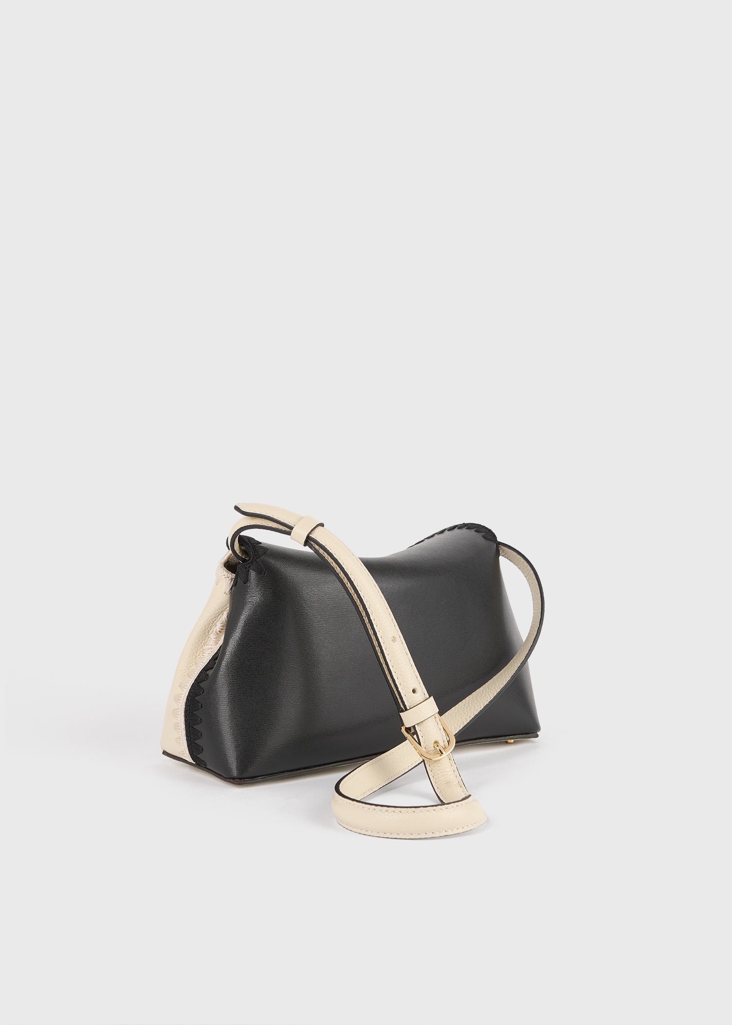 T-lock embroidered leather clutch black/milk