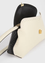 T-lock embroidered leather clutch black/milk