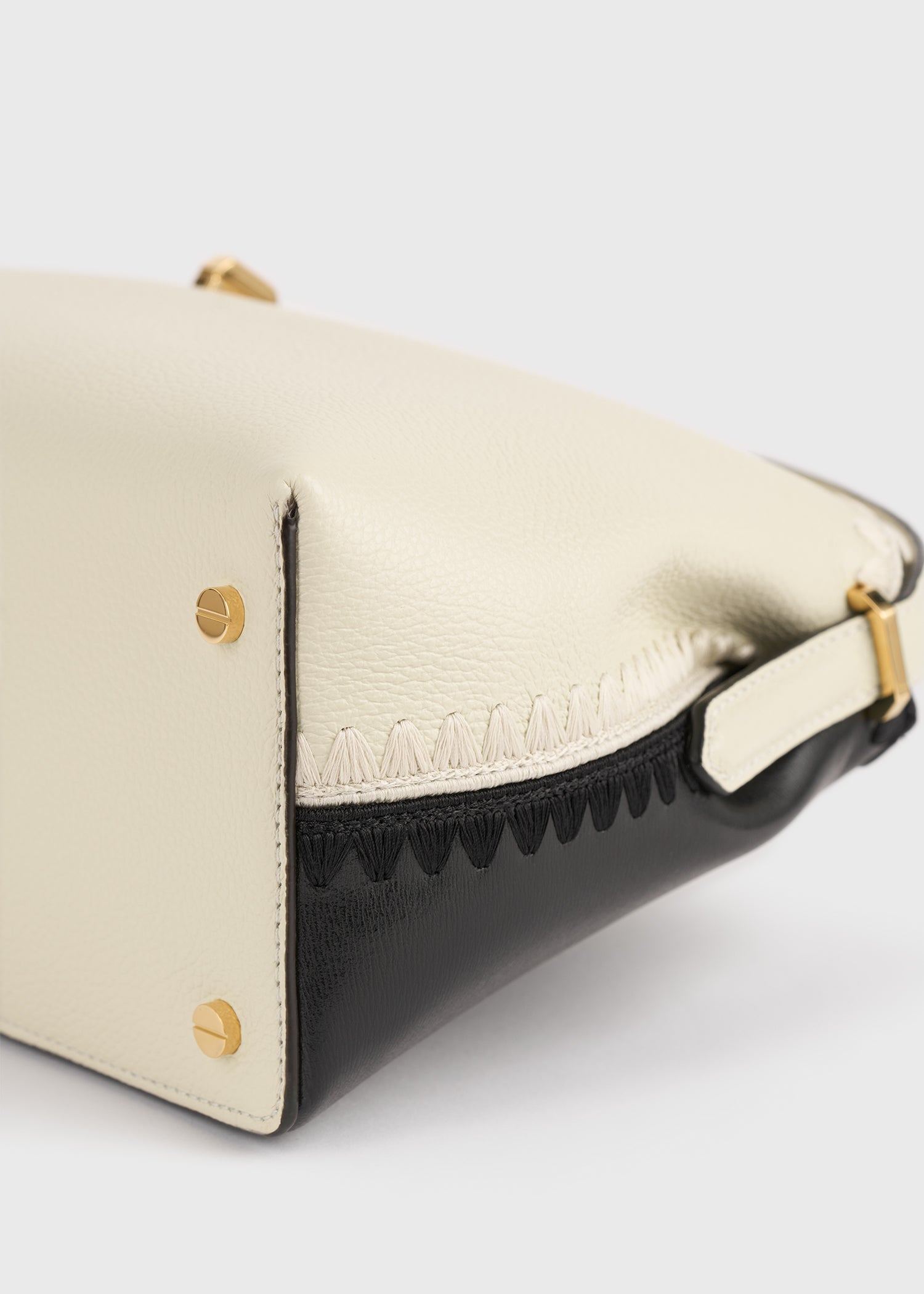 T-lock embroidered leather top handle black/milk