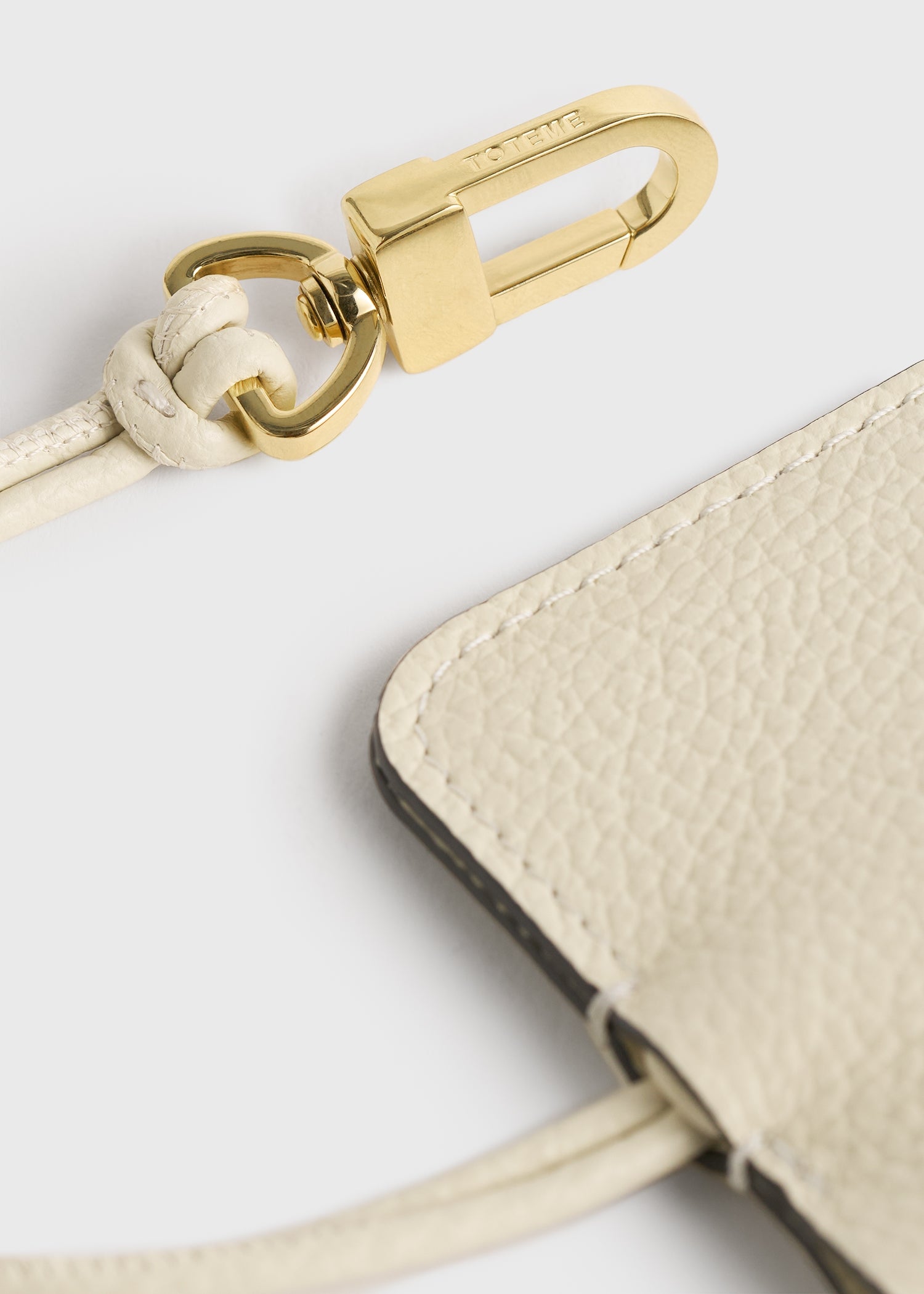 Grained-leather keyring milk