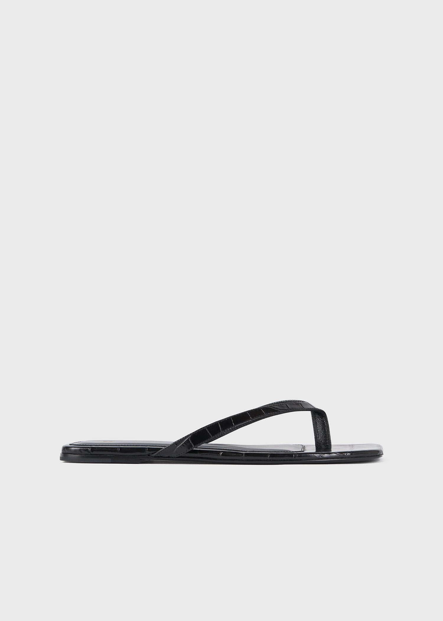 Croco-embossed flip flops black