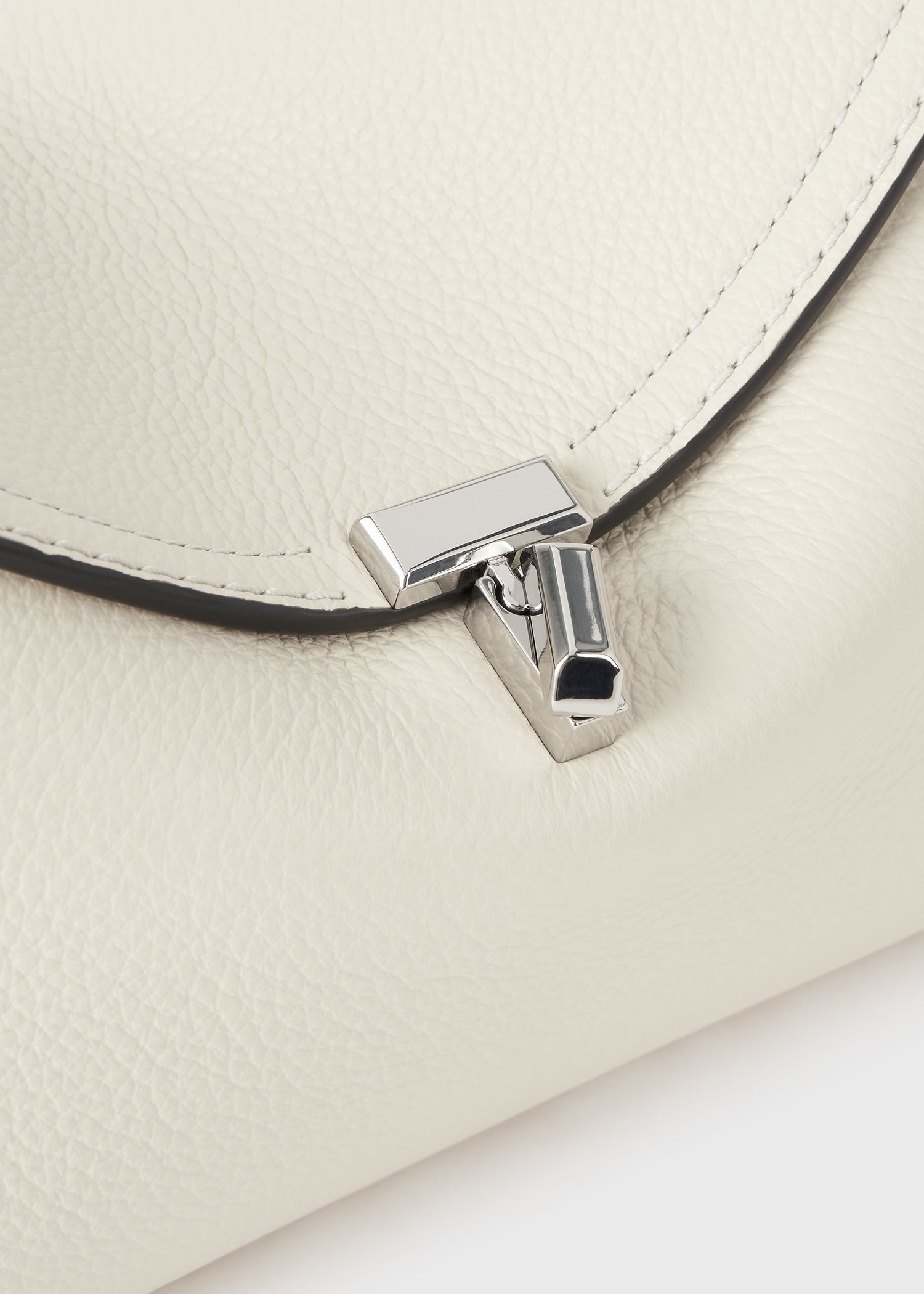 T-lock grained-leather clutch milk – TOTEME