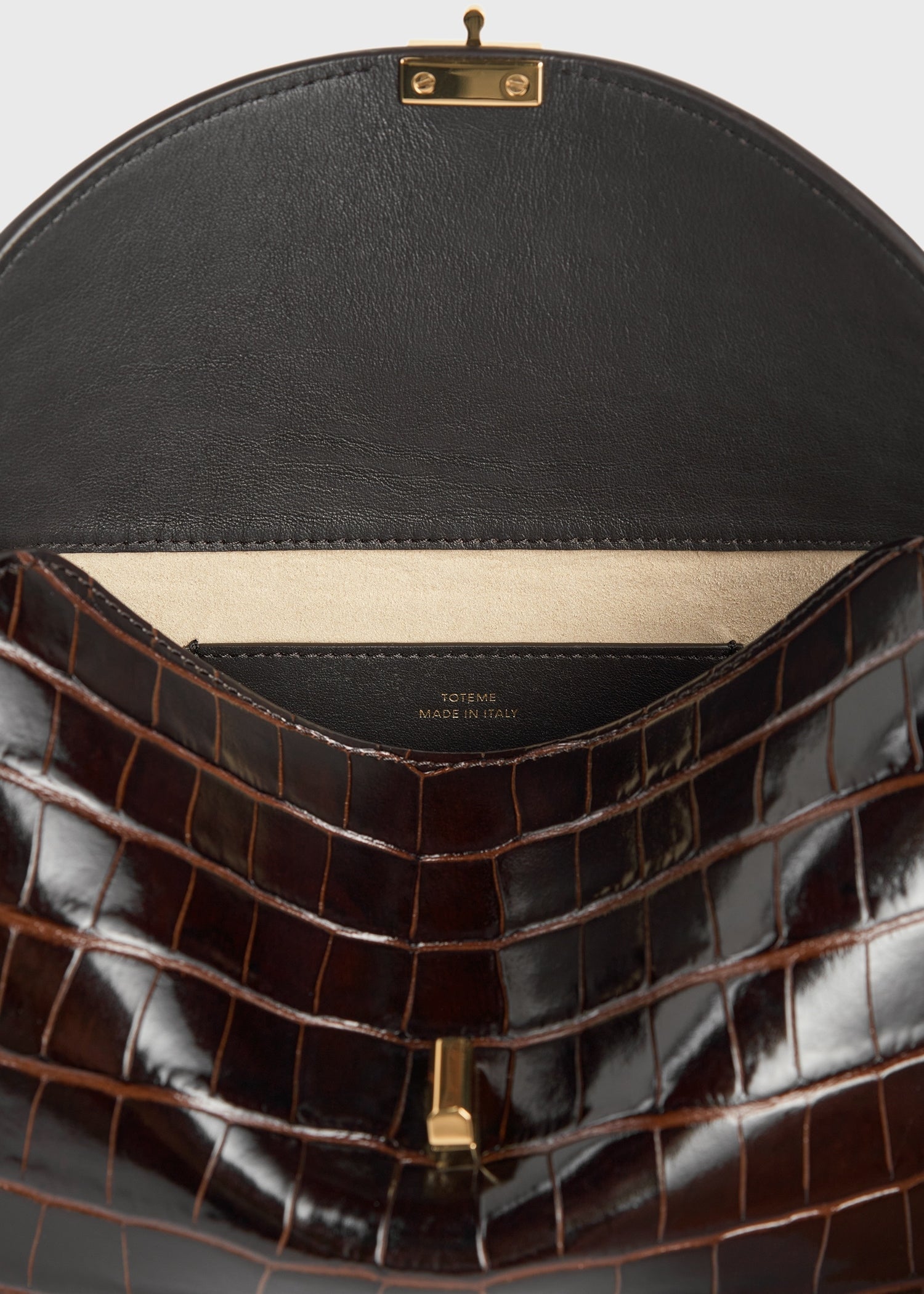 T-lock croco-embossed clutch dark brown