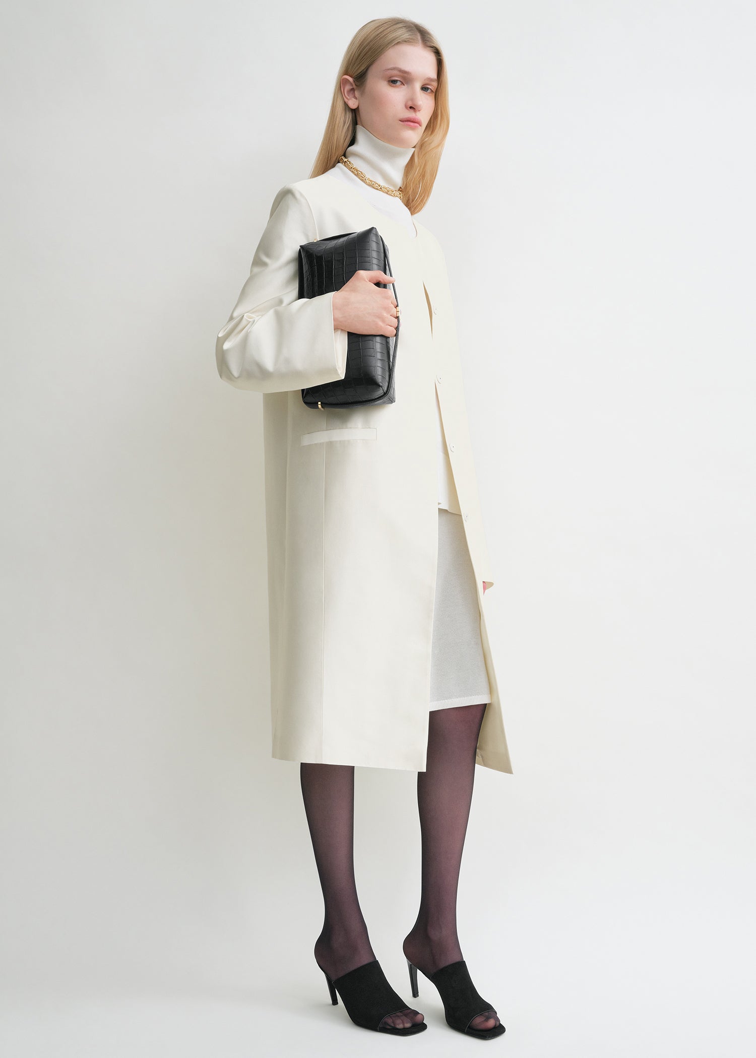 Belted croco-embossed clutch black