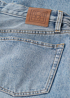 Twisted seam denim full length worn blue