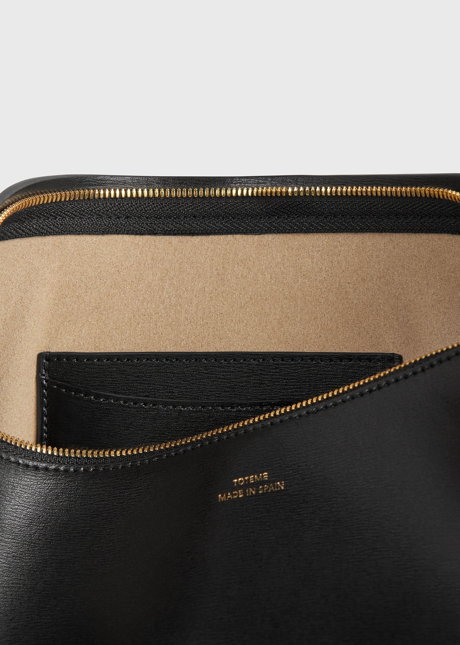 Leather scooped sling black