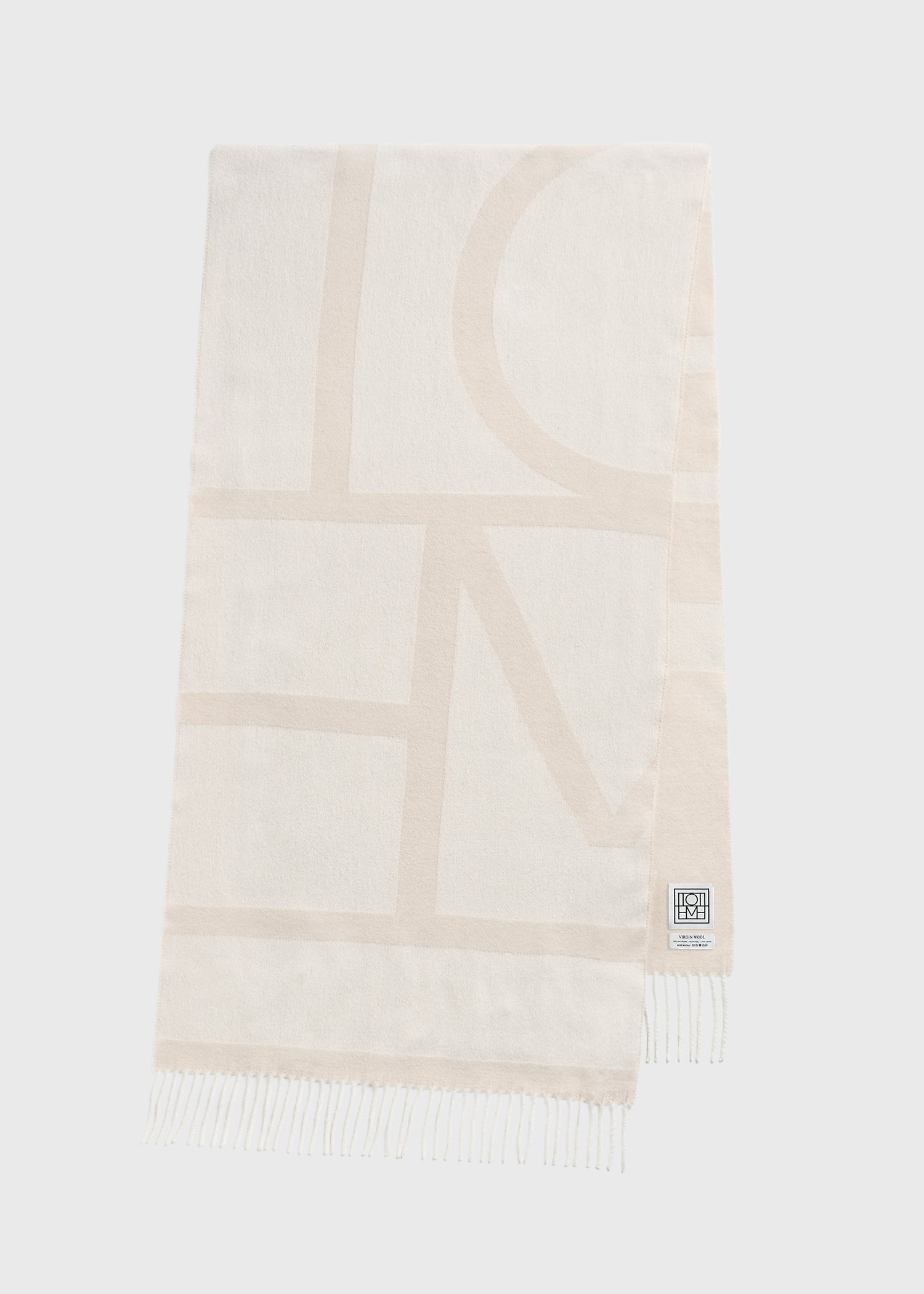 Monogram jacquard wool scarf eggnog – TOTEME