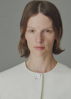 Collarless cinched jacket ecru