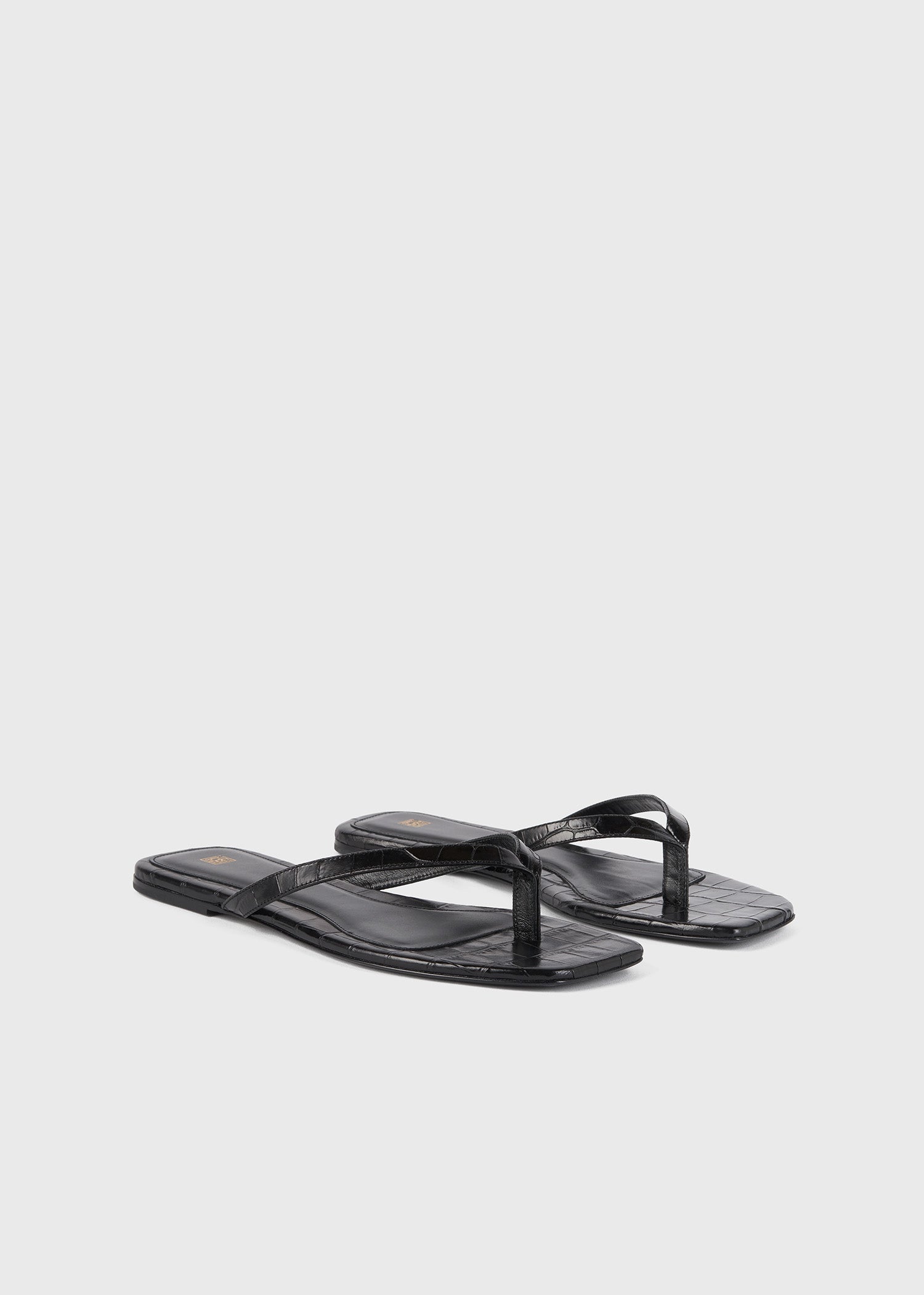 Croco-embossed flip flops black – TOTEME
