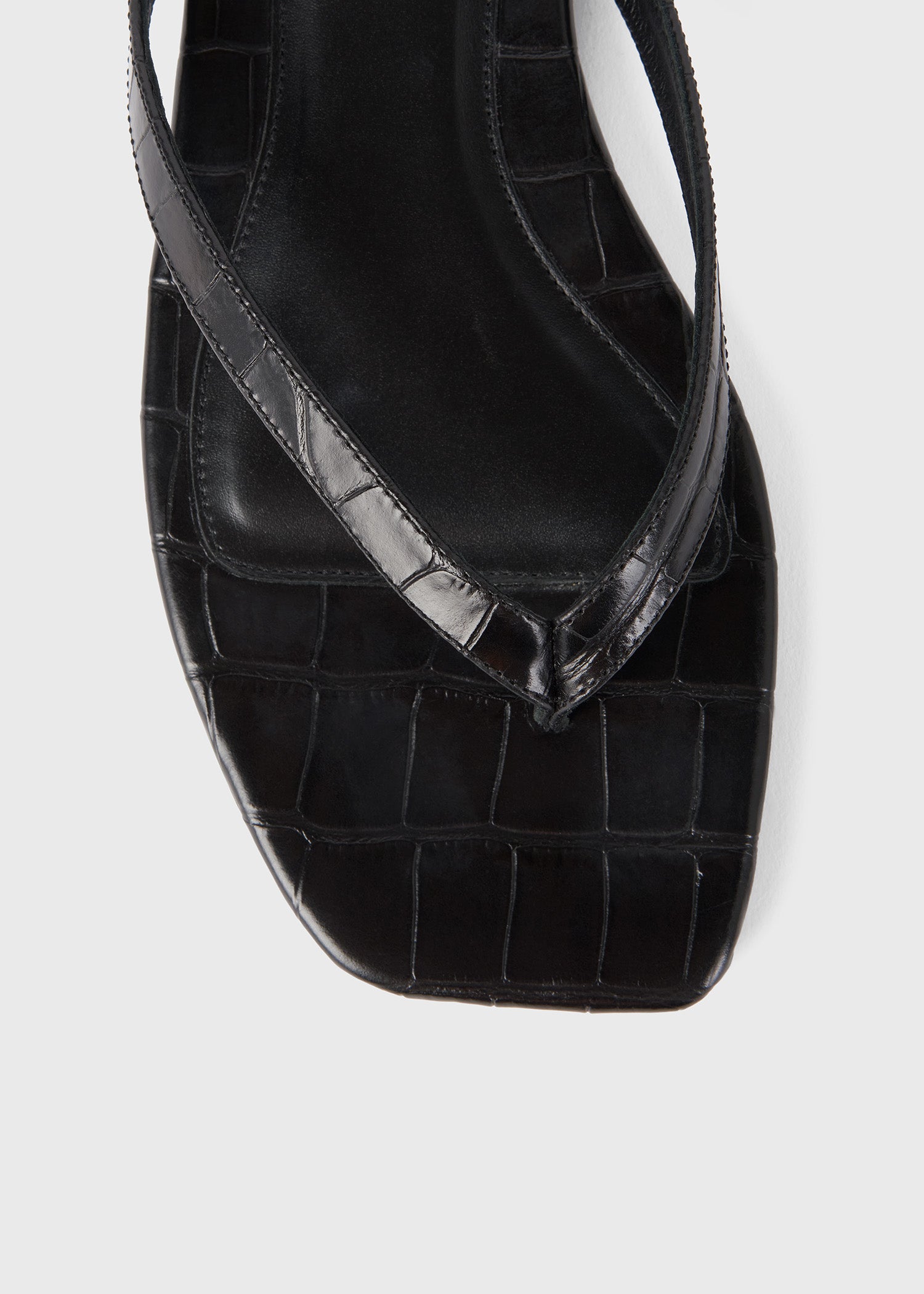 Croco-embossed flip flops black – TOTEME